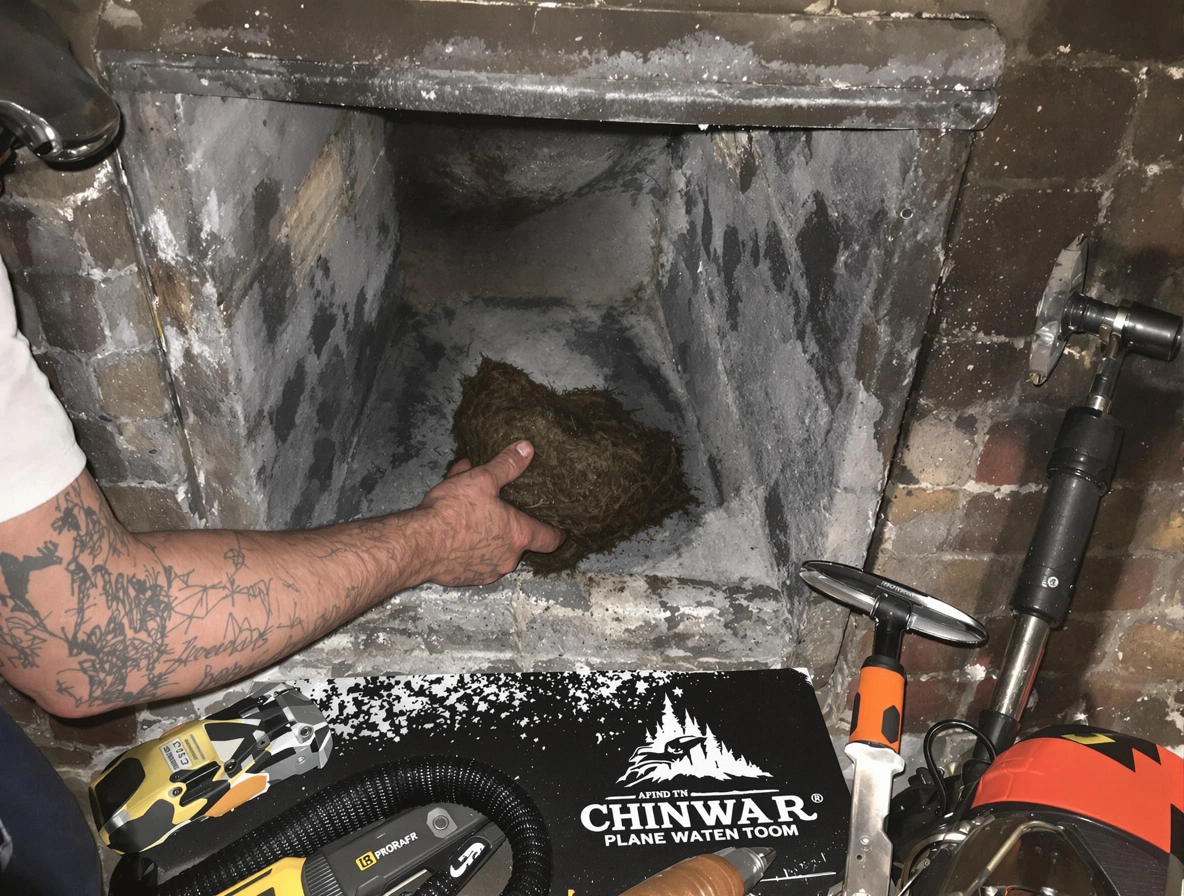 Easton Chimney Sweep safely removing debris and screening chimney in Easton, MA