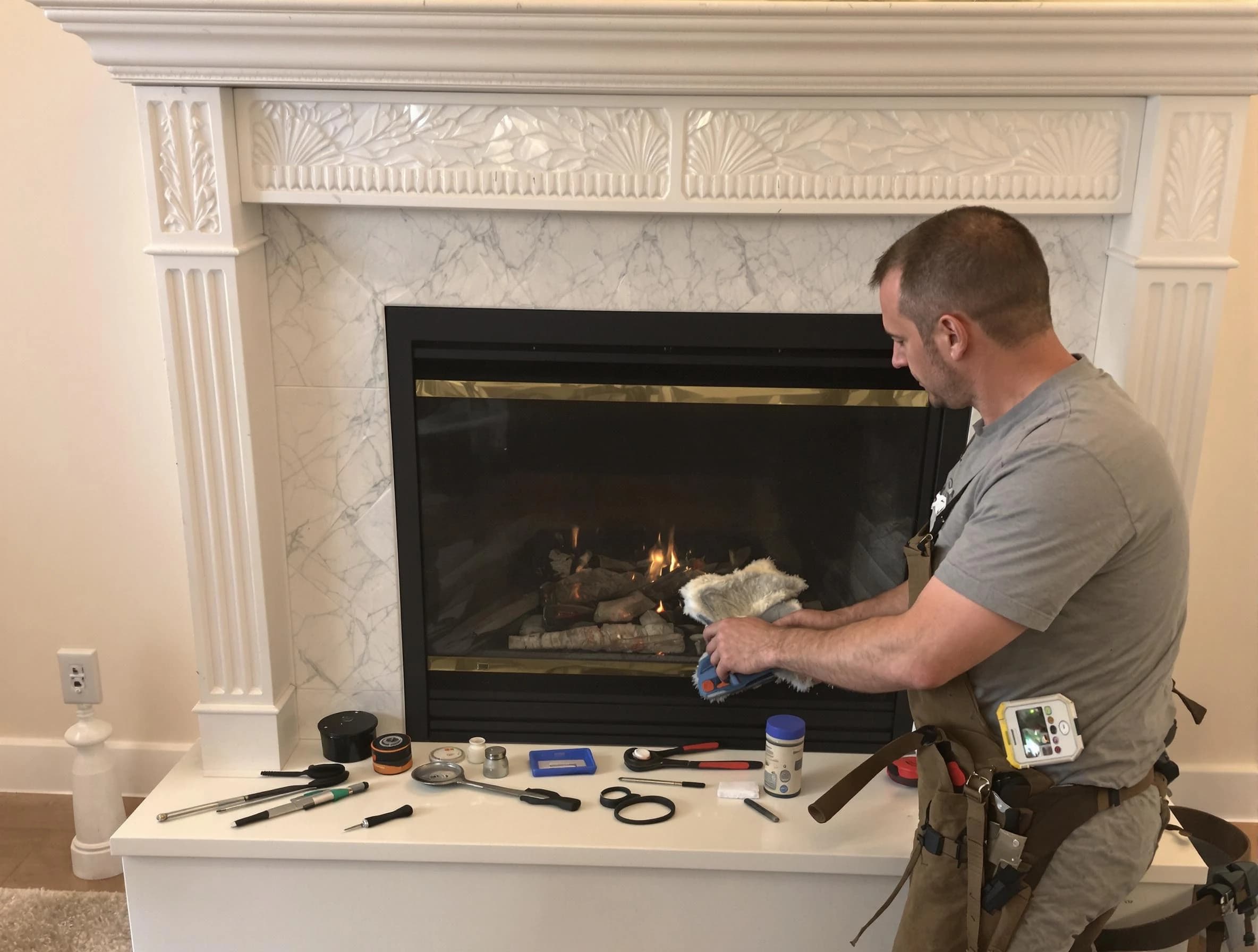 Easton Chimney Sweep performing fireplace maintenance in Easton, MA